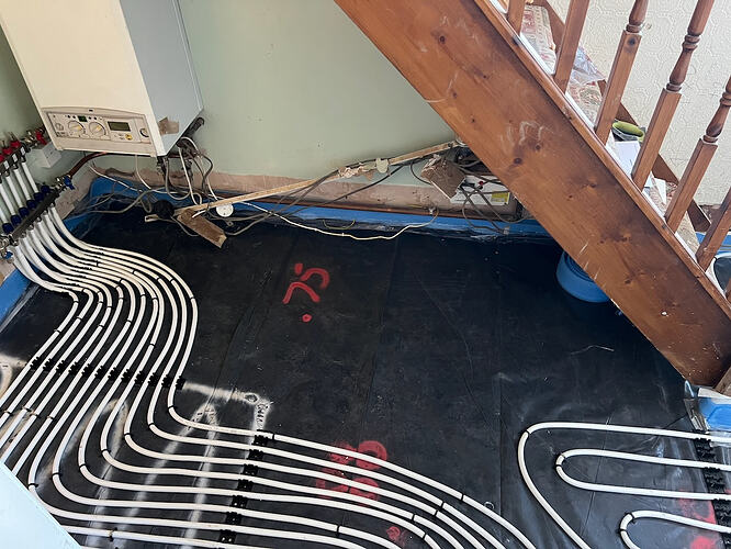 manifold and boiler under stairs - 1